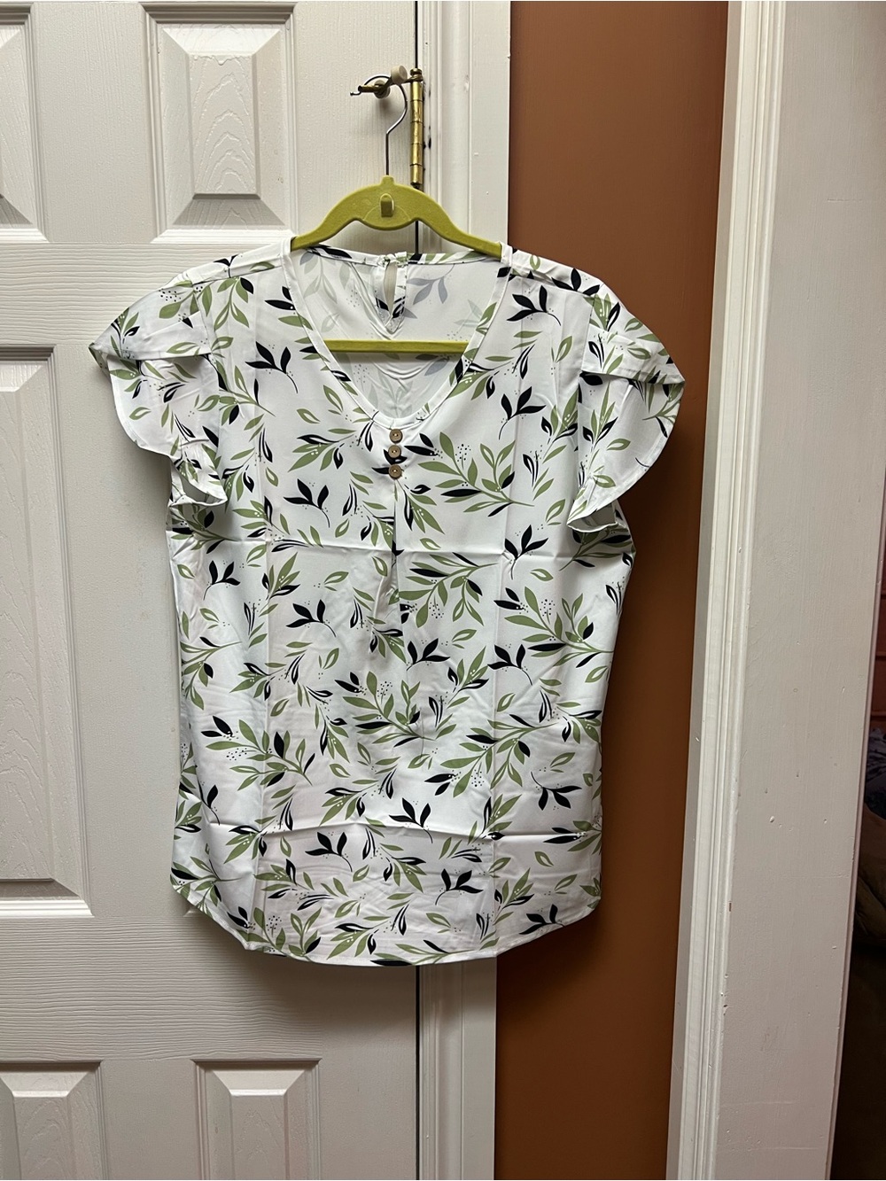 V-Neck Flutter Sleeve Blouse in White with Green Leaf Print